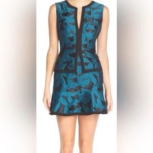 BCBG Suni Black & Teal Feather Print Peplum Dress
